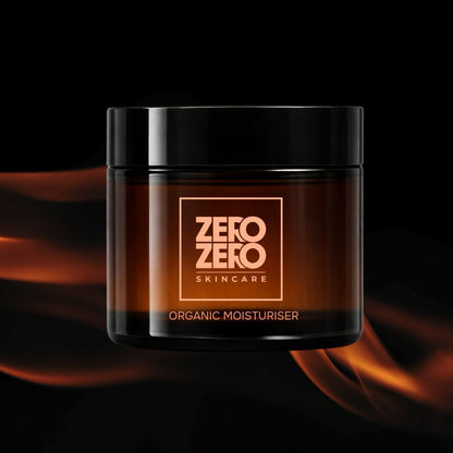 Zero Zero Skincare organic moisturizer jar with orange smoke effects on a dark background