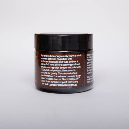 Amber glass cosmetics jar with black lid and white writing with instructions on how to use.